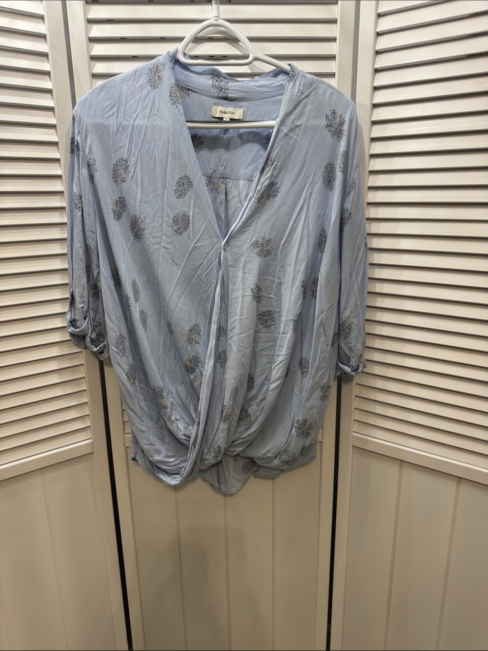 Babaton Light Blue Twist-Front Tunic with Subtle Floral Motif